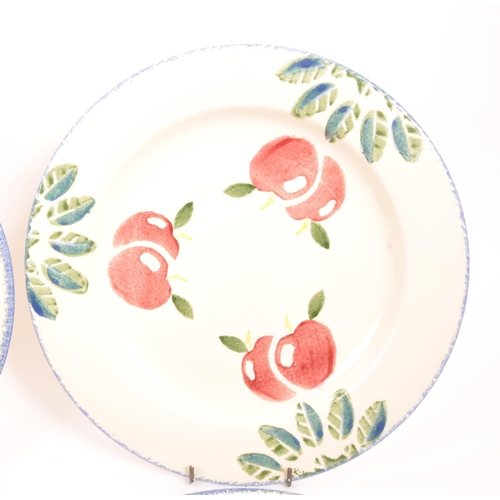 77 - Poole Pottery - A collection of contemporary plates, of various sizes with cherry print for decorati... 