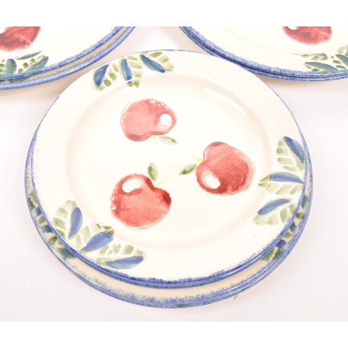 77 - Poole Pottery - A collection of contemporary plates, of various sizes with cherry print for decorati... 