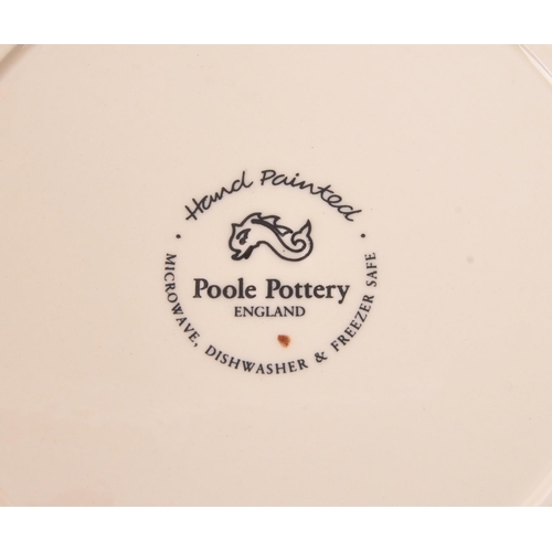 77 - Poole Pottery - A collection of contemporary plates, of various sizes with cherry print for decorati... 