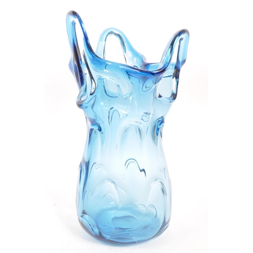 79 - Jan Beranek - A vintage 20th century studio art glass vase. In a blue colourway with pierced decorat... 