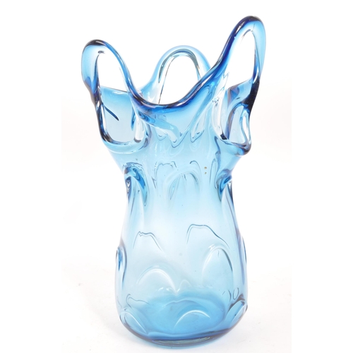 79 - Jan Beranek - A vintage 20th century studio art glass vase. In a blue colourway with pierced decorat... 