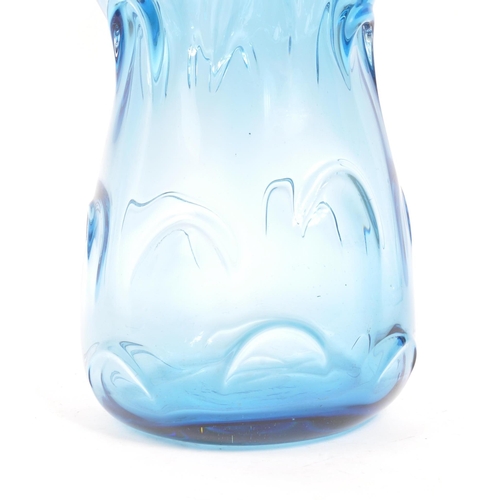 79 - Jan Beranek - A vintage 20th century studio art glass vase. In a blue colourway with pierced decorat... 