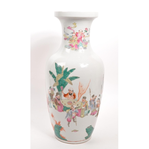 87 - A large early 20th Century Chinese famille rose ceramic vase with hand painted oriental scenes of fi... 