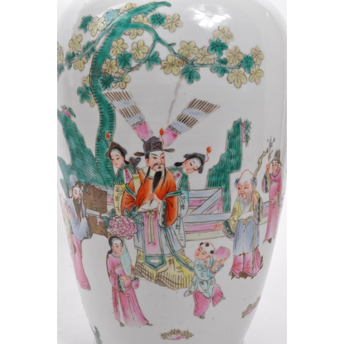 87 - A large early 20th Century Chinese famille rose ceramic vase with hand painted oriental scenes of fi... 