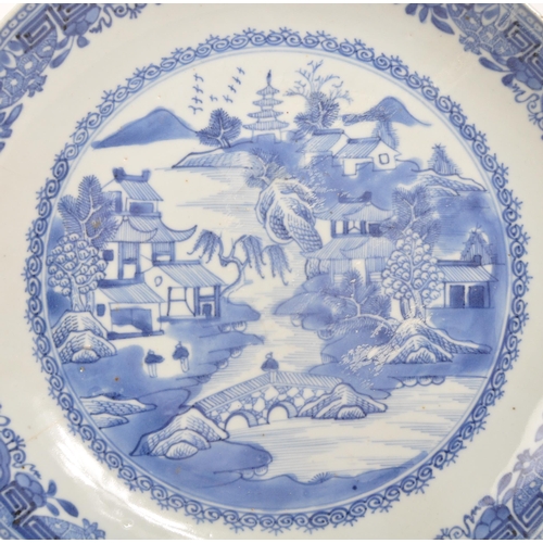 91 - A 19th Century Chinese porcelain blue and white bowl with oriental / willow pattern design to centre... 