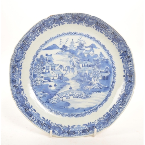 91 - A 19th Century Chinese porcelain blue and white bowl with oriental / willow pattern design to centre... 