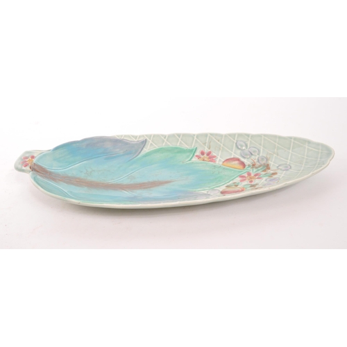 93 - Clarice Cliff - Newport Pottery, England - A vintage 20th century ceramic pottery leaf plate / dish.... 