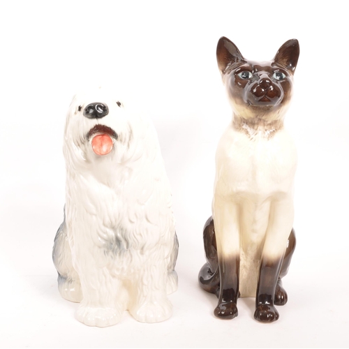 96 - Beswick - Two vintage 20th century porcelain ceramic animal figures / statues. Comprising of a Siame... 