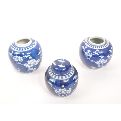 97 - A collection of three 20th Century Chinese ceramic blue and white prunus ginger jars. All of ovoid s... 