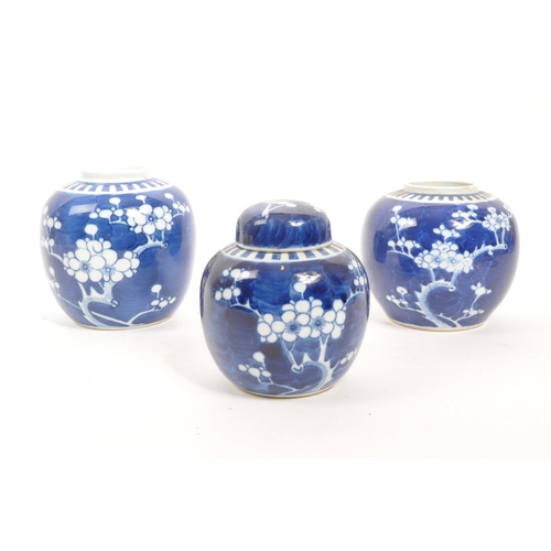 97 - A collection of three 20th Century Chinese ceramic blue and white prunus ginger jars. All of ovoid s... 