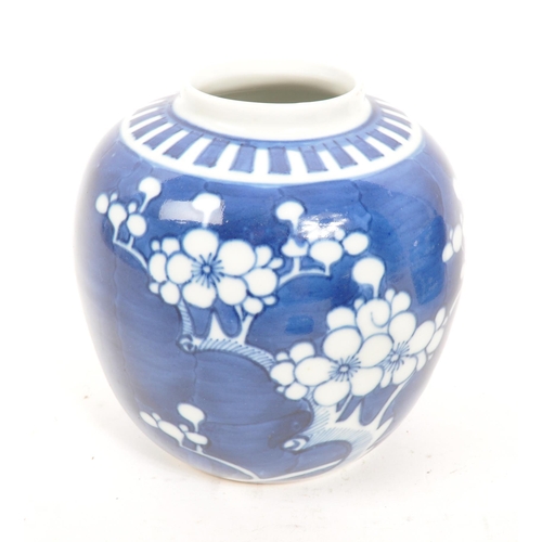 97 - A collection of three 20th Century Chinese ceramic blue and white prunus ginger jars. All of ovoid s... 