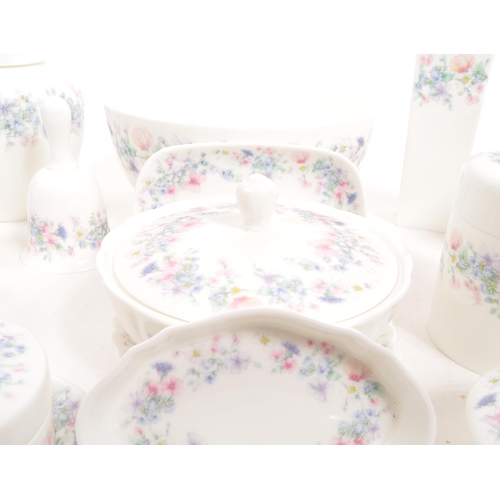 98 - Wedgwood - Angela - A late 20th century porcelain china table dressing set. Comprising of bud vases,... 