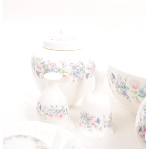 98 - Wedgwood - Angela - A late 20th century porcelain china table dressing set. Comprising of bud vases,... 