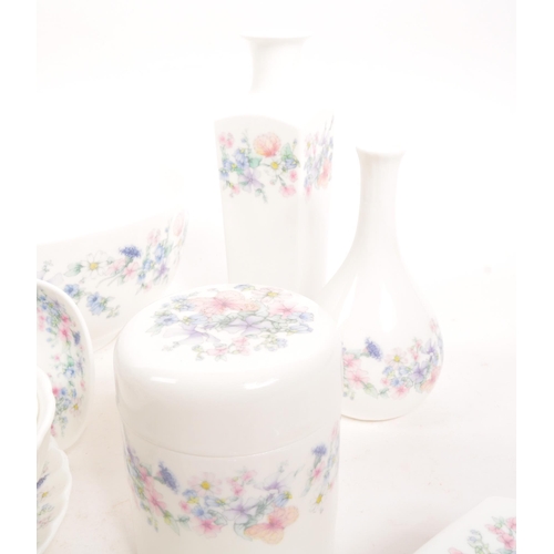 98 - Wedgwood - Angela - A late 20th century porcelain china table dressing set. Comprising of bud vases,... 