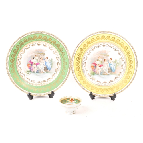 18 - Believed to be Royal Vienna - Two early 20th Century porcelain china display plates bearing the Roya... 