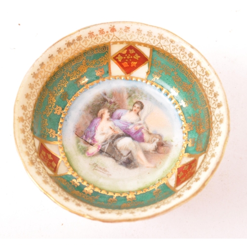 18 - Believed to be Royal Vienna - Two early 20th Century porcelain china display plates bearing the Roya... 