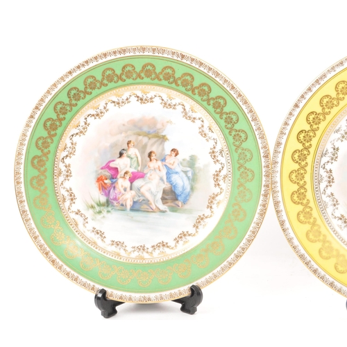 18 - Believed to be Royal Vienna - Two early 20th Century porcelain china display plates bearing the Roya... 