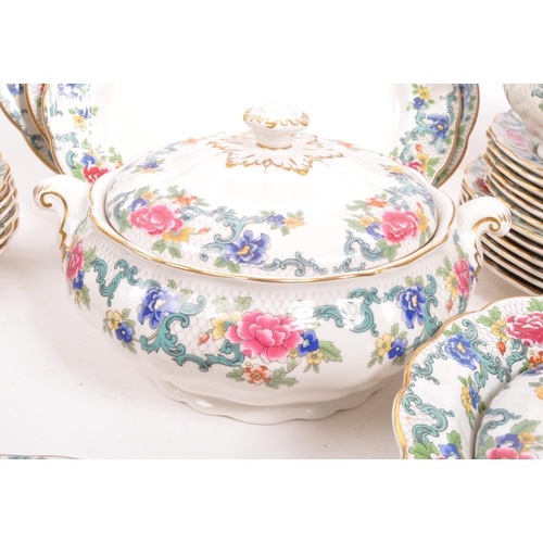 128 - Booths / Royal Doulton - A 20th Century ceramic Booths dinner service in the Floradora pattern with ... 