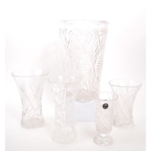 132 - A large 20th Century vintage crystal cut glass vase having repeated geometric diamond and star cuts.... 