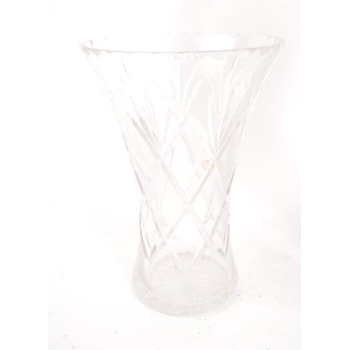 132 - A large 20th Century vintage crystal cut glass vase having repeated geometric diamond and star cuts.... 