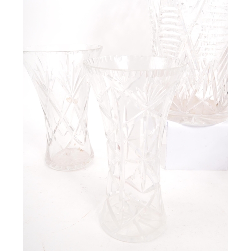 132 - A large 20th Century vintage crystal cut glass vase having repeated geometric diamond and star cuts.... 