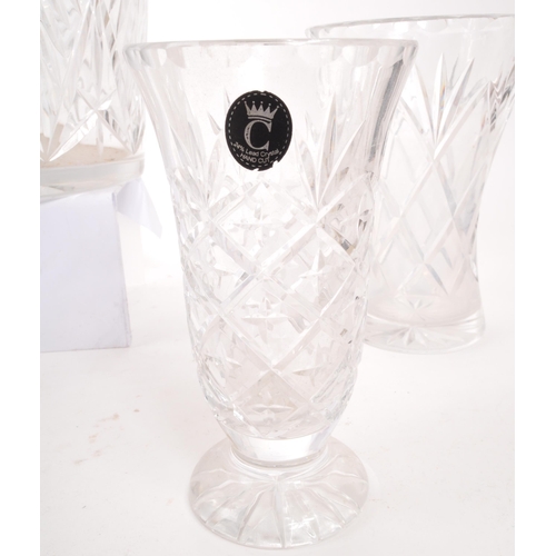 132 - A large 20th Century vintage crystal cut glass vase having repeated geometric diamond and star cuts.... 