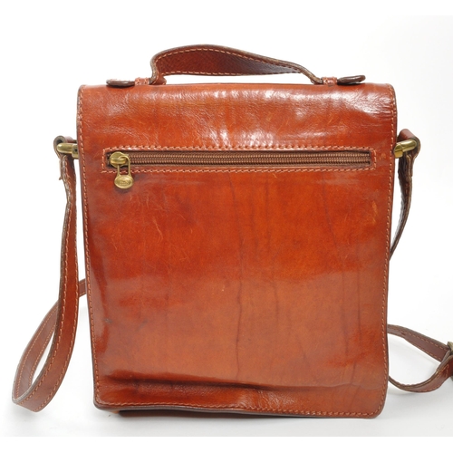 301 - The Bridge - A 20th century leather satchel side bag. The bag having shoulder strap, and handle to t... 