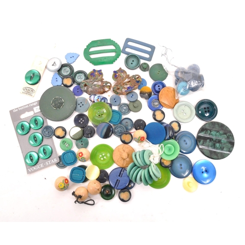 300 - A collection of 20th Century vintage buttons in blue / green colourway. Having varying sizes and sha... 