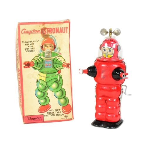 405 - Tinplate Toys - a vintage Japanese Cragstan Astronaut robot. Featuring clear plastic helmet with spi... 