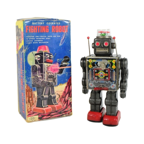 406 - Tinplate Toys - a vintage Japanese (Horikawa) tinplate battery operated Fighting Robot. Moving arms,... 