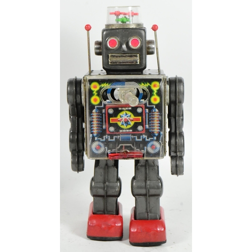 406 - Tinplate Toys - a vintage Japanese (Horikawa) tinplate battery operated Fighting Robot. Moving arms,... 