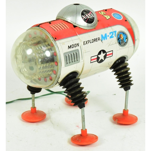 407 - Tinplate Toys - a vintage 1960s Japanese Yonezawa Moon Explorer M-27 robot. Featuring separate blue ... 