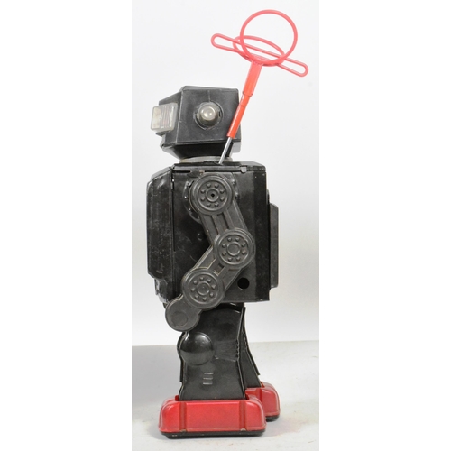 413 - Tinplate Toys - a vintage Japanese SH Horikawa Space Explorer, including the antenna. Featuring stop... 