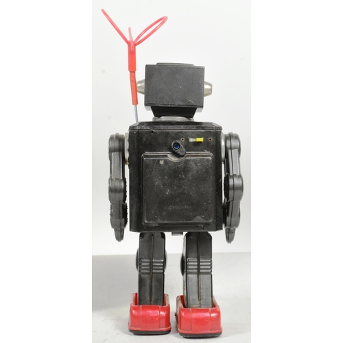 413 - Tinplate Toys - a vintage Japanese SH Horikawa Space Explorer, including the antenna. Featuring stop... 