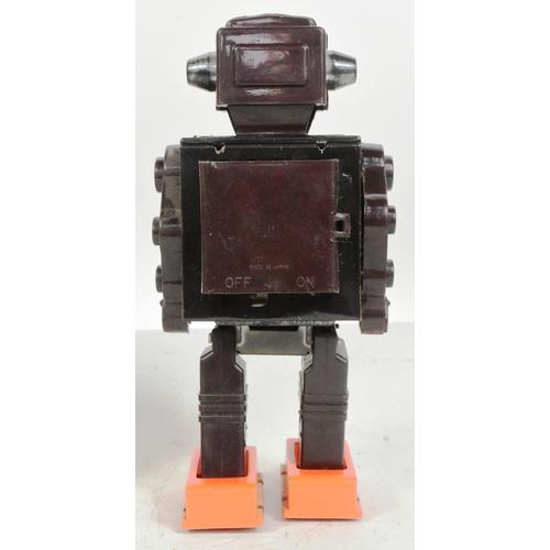 418 - Tinplate Toys - a vintage Japanese SH Horikawa Mr. Zerox robot, featuring stop'n go action, blinking... 