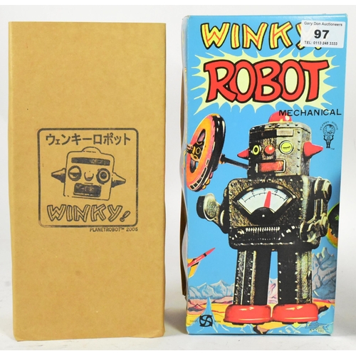 419 - Tinplate Toys - a vintage Japanese mechanical Winky Robot, No. 101. Tested, in excellent, working co... 