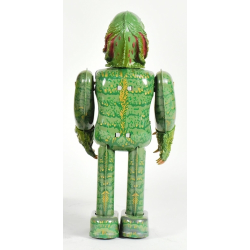 427 - Tinplate Toys - a 1991 Japanese Universal Studios Monsters Creature From The Black Lagoon wind-up ro... 