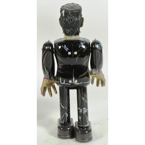 431 - Tinplate Toys - a 1991 Japanese Universal Studios Frankenstein wind-up robot. Tested, in excellent, ... 