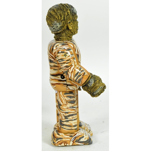 432 - Tinplate Toys - a 1991 Japanese Universal Studios The Mummy wind-up robot. Tested, in excellent, wor... 