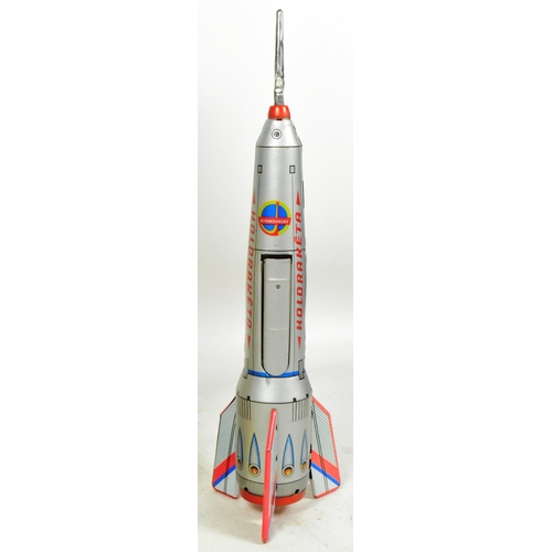 448 - Tinplate Toys - a Hungarian Holdraketa space rocket. All mechanisms working apart from the door open... 