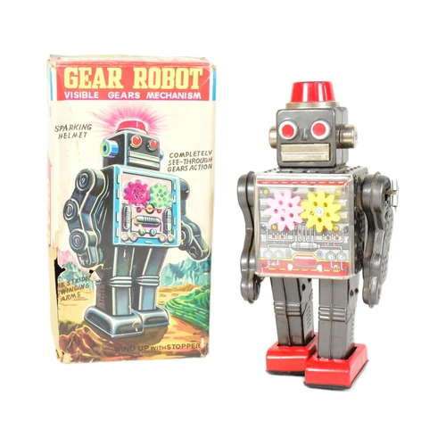 450 - Tinplate Toys - a vintage Japanese SH Horikawa Gear Robot, featuring a sparking helmet, see-through ... 