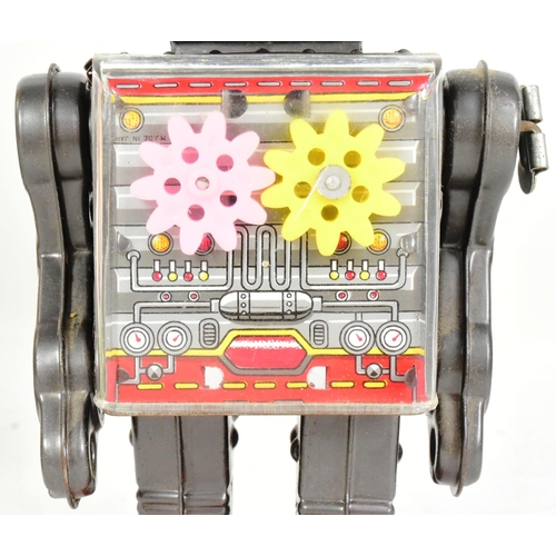 450 - Tinplate Toys - a vintage Japanese SH Horikawa Gear Robot, featuring a sparking helmet, see-through ... 