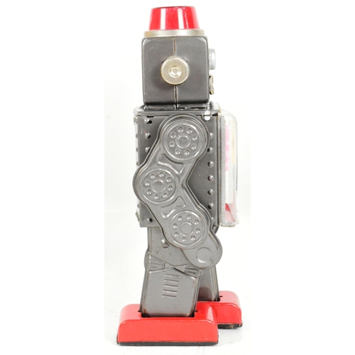 450 - Tinplate Toys - a vintage Japanese SH Horikawa Gear Robot, featuring a sparking helmet, see-through ... 