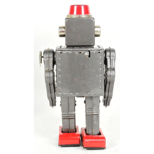 450 - Tinplate Toys - a vintage Japanese SH Horikawa Gear Robot, featuring a sparking helmet, see-through ... 