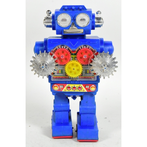 451 - Retro Toys - a vintage Japanese SH battery operated Excavator Robot. Featuring visible gears, revolv... 