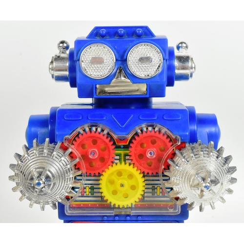 451 - Retro Toys - a vintage Japanese SH battery operated Excavator Robot. Featuring visible gears, revolv... 