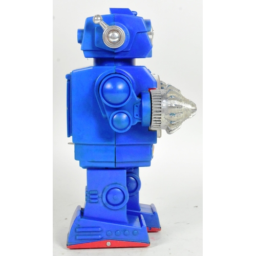 451 - Retro Toys - a vintage Japanese SH battery operated Excavator Robot. Featuring visible gears, revolv... 