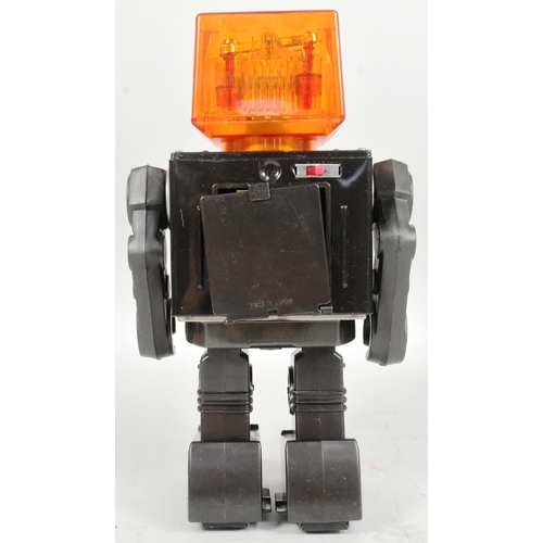 485 - Tinplate Toys - a vintage Japanese SH Horikawa battery operated Piston Robot, featuring see through ... 