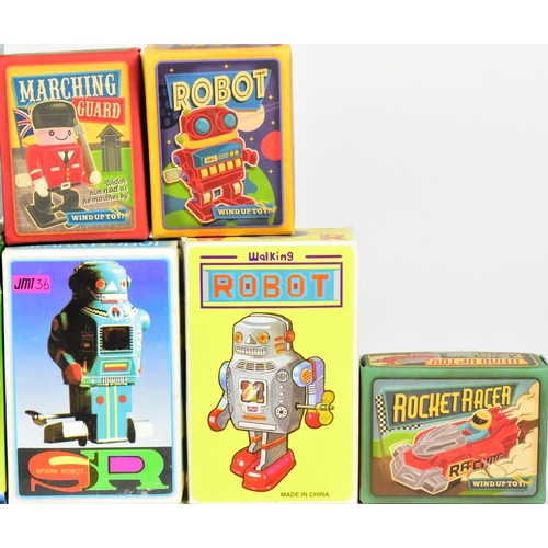 514 - Retro Toys - a collection of x13 wind-up robots from various makers, such as Saint John, Fantastic &... 