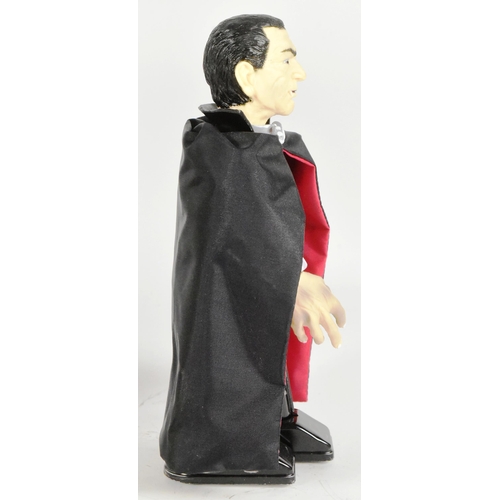 517 - Tinplate Toys - a 1990s Japanese Universal Studios Monsters Dracula wind-up robot, by Mike Company. ... 